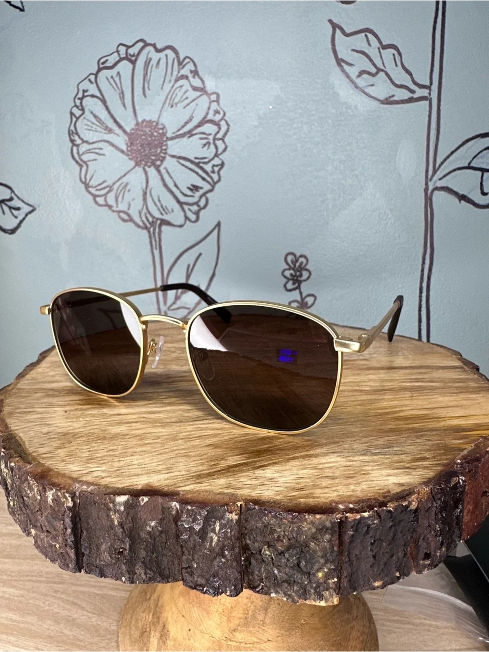 Calvin Klein Gold Frame Sunglasses with Dark Lenses
